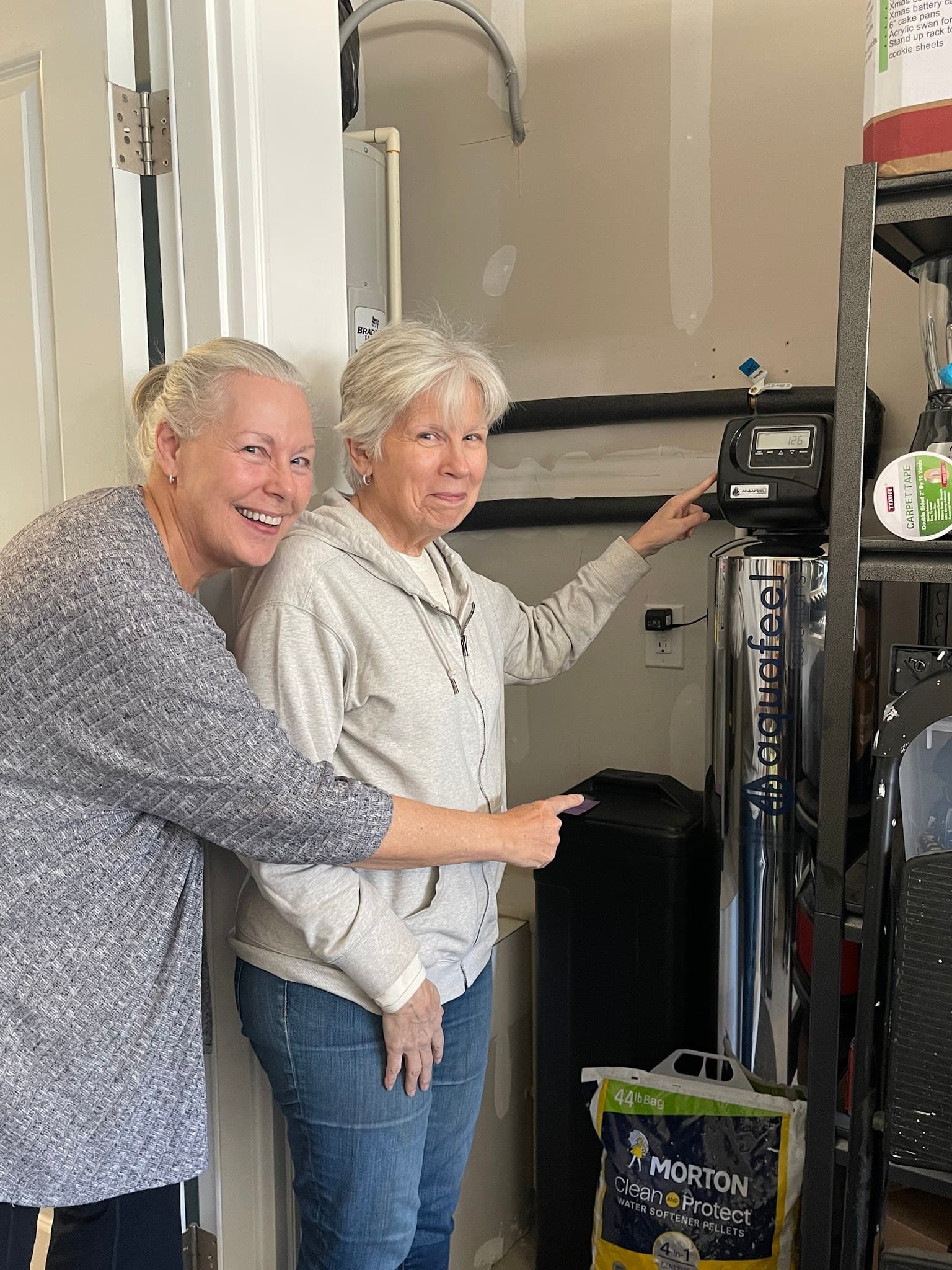 Happy customers with their installed Aquafeel water system