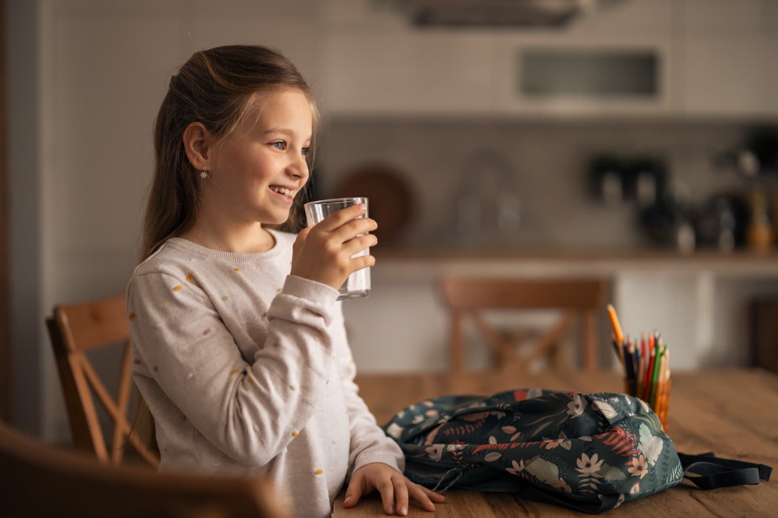 Girl drinking pure alkaline water
